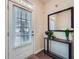 Inviting entryway with natural light, decorative mirror, stylish console table and decor at 1963 Lakeshore Overlook Nw Cir, Kennesaw, GA 30152