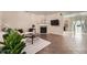 Cozy living room with a fireplace, tile floors, comfortable seating and natural light at 1963 Lakeshore Overlook Nw Cir, Kennesaw, GA 30152