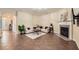Inviting living room featuring a fireplace, neutral walls, and tile flooring at 1963 Lakeshore Overlook Nw Cir, Kennesaw, GA 30152