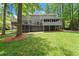 Expansive backyard view featuring a large back deck and forest surround at 2871 Liberty Ct, Marietta, GA 30066