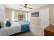 Cozy bedroom with natural light, neutral paint colors, and carpeted floors at 2871 Liberty Ct, Marietta, GA 30066