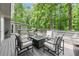View of spacious wooden deck features outdoor seating and forest views at 2871 Liberty Ct, Marietta, GA 30066