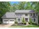 Beautiful gray brick home with attached two car garage and bay windows at 2871 Liberty Ct, Marietta, GA 30066