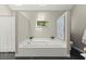 The main bathroom features a large soaking tub, a window for natural light, and neutral tones at 2871 Liberty Ct, Marietta, GA 30066