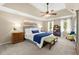 Well-lit main bedroom features trey ceilings, plush carpet, and windows that let in natural light at 2871 Liberty Ct, Marietta, GA 30066