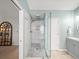 Bathroom showcases glass shower, double sink, tile floor, and natural lighting at 510 Rosedown Way, Alpharetta, GA 30022