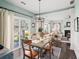 Bright dining area offering a view of the living room and backyard at 510 Rosedown Way, Alpharetta, GA 30022