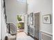 Bright and airy foyer featuring high ceilings, hardwood floors, and a view of the front yard at 510 Rosedown Way, Alpharetta, GA 30022
