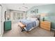 Comfortable main bedroom with decorative pillows, curtains, and natural lighting at 510 Rosedown Way, Alpharetta, GA 30022