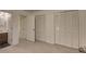 Bright bedroom featuring access to an ensuite bath and a large closet at 6 Holly Downs Nw Ct, Atlanta, GA 30318