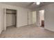 This bedroom has a walk-in closet and ensuite bathroom at 6 Holly Downs Nw Ct, Atlanta, GA 30318