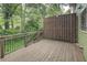 Outdoor wooden deck perfect for relaxing and outdoor dining at 6 Holly Downs Nw Ct, Atlanta, GA 30318