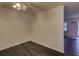 Bright dining area with hardwood floors and a modern light fixture at 6 Holly Downs Nw Ct, Atlanta, GA 30318