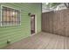 The exterior features a wooden deck perfect for enjoying the outdoors at 6 Holly Downs Nw Ct, Atlanta, GA 30318