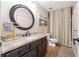 Charming bathroom with granite countertop vanity, stylish fixtures, and soft lighting, creating a relaxing atmosphere at 6640 Stratford Pl, Cumming, GA 30040