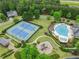 Aerial view of community amenities including pool, tennis courts and playground at 912 Santa Anita Dr, Woodstock, GA 30189