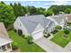 Charming two-story home with a well-manicured lawn and a welcoming curb appeal in a suburban neighborhood at 912 Santa Anita Dr, Woodstock, GA 30189