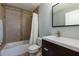 Modern bathroom features a tiled shower, sleek vanity, and contemporary fixtures at 3102 Balearic Se Dr, Marietta, GA 30067