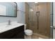 Stylish bathroom with glass shower, modern vanity, and stone accents at 3102 Balearic Se Dr, Marietta, GA 30067