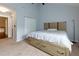 Comfortable bedroom with a large bed, a closet, and ample natural light at 3102 Balearic Se Dr, Marietta, GA 30067