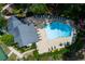 Community pool area with lounge chairs and landscaped surroundings at 3102 Balearic Se Dr, Marietta, GA 30067