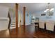 Open concept dining room area with hardwood floors and wood structural posts at 3102 Balearic Se Dr, Marietta, GA 30067