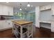 Eat in kitchen features stainless appliances, tile backsplash and lots of natural light at 3102 Balearic Se Dr, Marietta, GA 30067