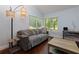 Comfortable living room with lots of natural light and cozy furniture at 3102 Balearic Se Dr, Marietta, GA 30067