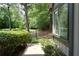 Serene side yard with lush landscaping, offering a peaceful retreat at 3102 Balearic Se Dr, Marietta, GA 30067