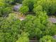 Aerial view of the lot surrounded by mature trees, offering a private and serene setting at 4643 River Ct, Peachtree Corners, GA 30097