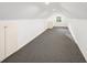 Spacious bonus room with carpeting, great for a home office or extra living area at 4643 River Ct, Peachtree Corners, GA 30097