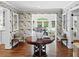 Foyer with floral wallpaper and a wood table at 4643 River Ct, Peachtree Corners, GA 30097