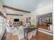 Bright living room with blue ceiling, wood beams and view to entryway at 4643 River Ct, Peachtree Corners, GA 30097
