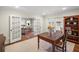 Bright home office with French doors, a classic desk, and a view into the Entryway at 4643 River Ct, Peachtree Corners, GA 30097