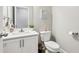Cozy half bathroom featuring a stylish vanity and decor for added convenience at 5575 Rock Place Ct, Norcross, GA 30093