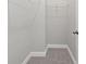Spacious walk-in closet with ample storage and organization features at 677 Stickley Oak Way, Woodstock, GA 30189