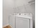 Laundry room with modern washer and dryer at 677 Stickley Oak Way, Woodstock, GA 30189