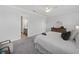 Bright main bedroom with neutral walls and doorway to the en suite bathroom at 677 Stickley Oak Way, Woodstock, GA 30189
