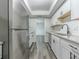 Updated kitchen with granite counters, stainless steel appliances and white subway tile backsplash at 6851 Roswell Rd # O-26, Atlanta, GA 30328