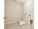 Empty laundry room ready for appliances at 1647 Shire Village Dr, Sugar Hill, GA 30518