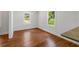 Dining room features hardwood floors, white walls, bright lighting and is next to the kitchen at 1798 S Gordon Sw St, Atlanta, GA 30310