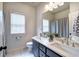 Contemporary bathroom featuring a double sink vanity and sleek fixtures at 18 Spring Lake Ne Trl, White, GA 30184