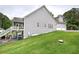 Charming home featuring a two-car garage, a backyard patio, and meticulously maintained landscaping at 18 Spring Lake Ne Trl, White, GA 30184