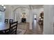 Open foyer with hardwood floors, arched doorways, and natural light at 18 Spring Lake Ne Trl, White, GA 30184