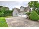 Home features a two-car garage at 18 Spring Lake Ne Trl, White, GA 30184