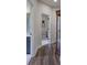 Hallway leading to the bathroom and bedroom, showcasing the hardwood flooring at 18 Spring Lake Ne Trl, White, GA 30184