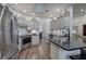 Well-equipped kitchen boasting stainless steel appliances, granite countertops, and ample cabinet space at 18 Spring Lake Ne Trl, White, GA 30184