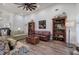 Comfortable living room showcasing hardwood floors, bookshelves, and a welcoming seating arrangement at 18 Spring Lake Ne Trl, White, GA 30184