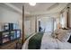 Spacious main bedroom with tray ceiling, large TV, and windows with plantation shutters at 18 Spring Lake Ne Trl, White, GA 30184