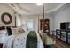 Bright and airy main bedroom with elegant decor and a view to ensuite bathroom at 18 Spring Lake Ne Trl, White, GA 30184